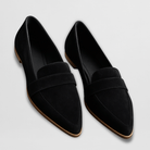 Overhead view of a leopard print suede loafer, showing the interior lining and cushioned insole for comfort.