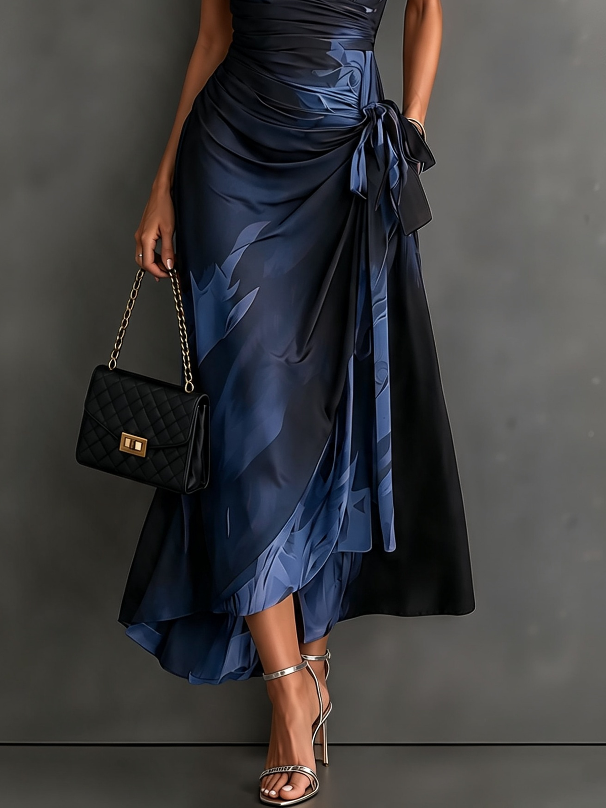 Detail of the shirt-style collar and V-neck on a black abstract maxi dress, focusing on the neckline.