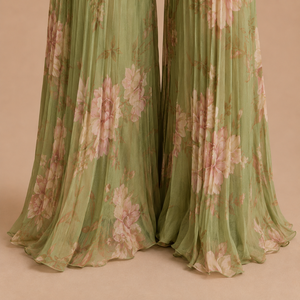 Back view of the solid green women's jumpsuit, highlighting the full length and comfortable fit.