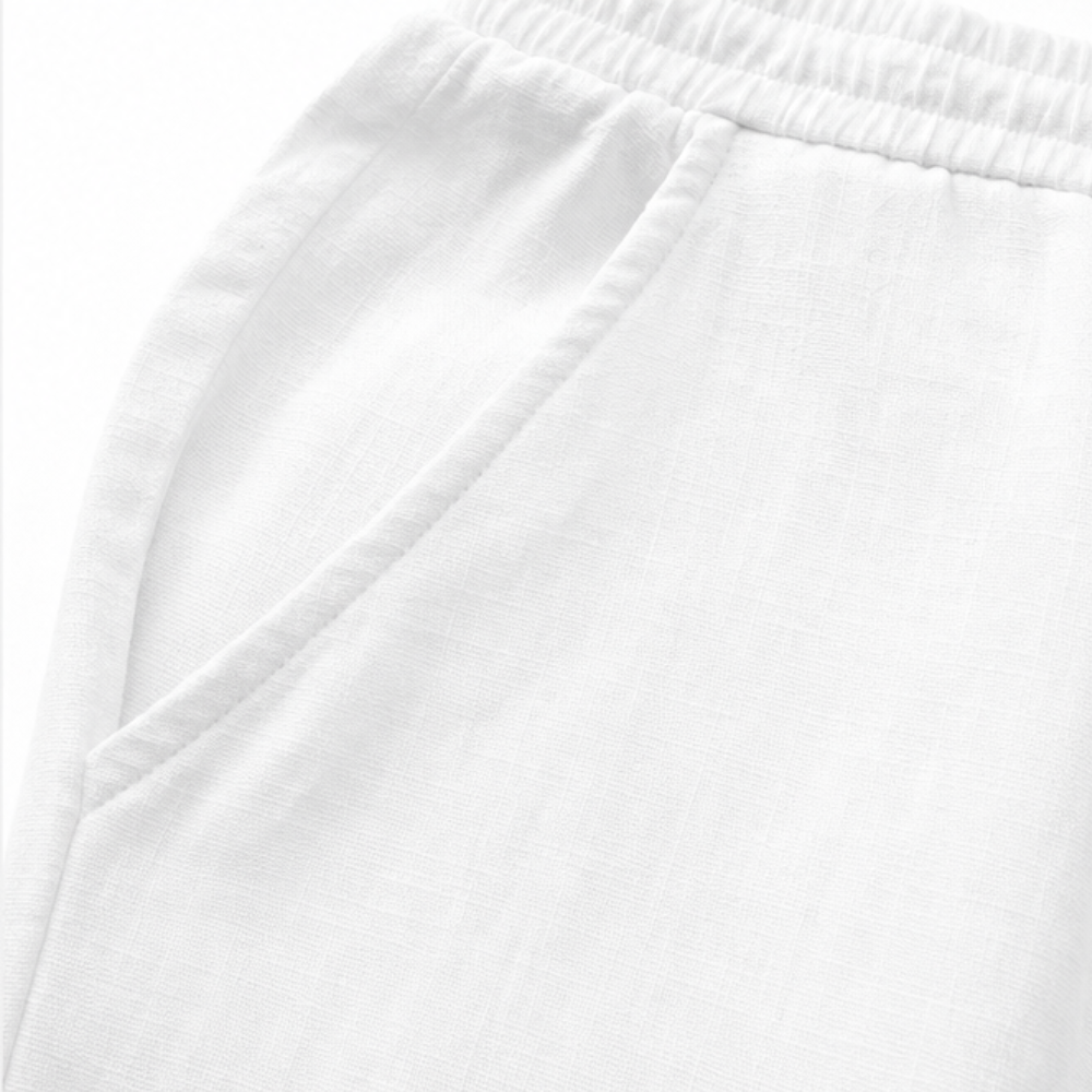 Close-up of the cotton-linen fabric texture, emphasizing its natural weave and softness for these trousers.