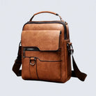 Front view of the Caleb minimalist shoulder bag in light brown, showcasing its structured design.