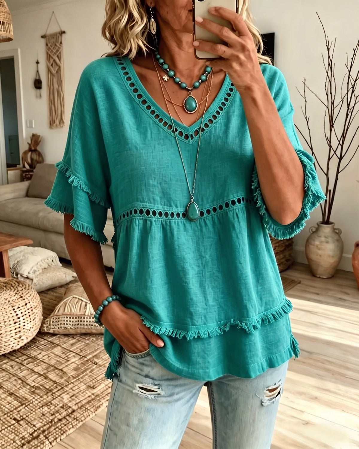 Front view of the Elowyn blouse in Aqua Green, showcasing the V-neckline and frill trim details.