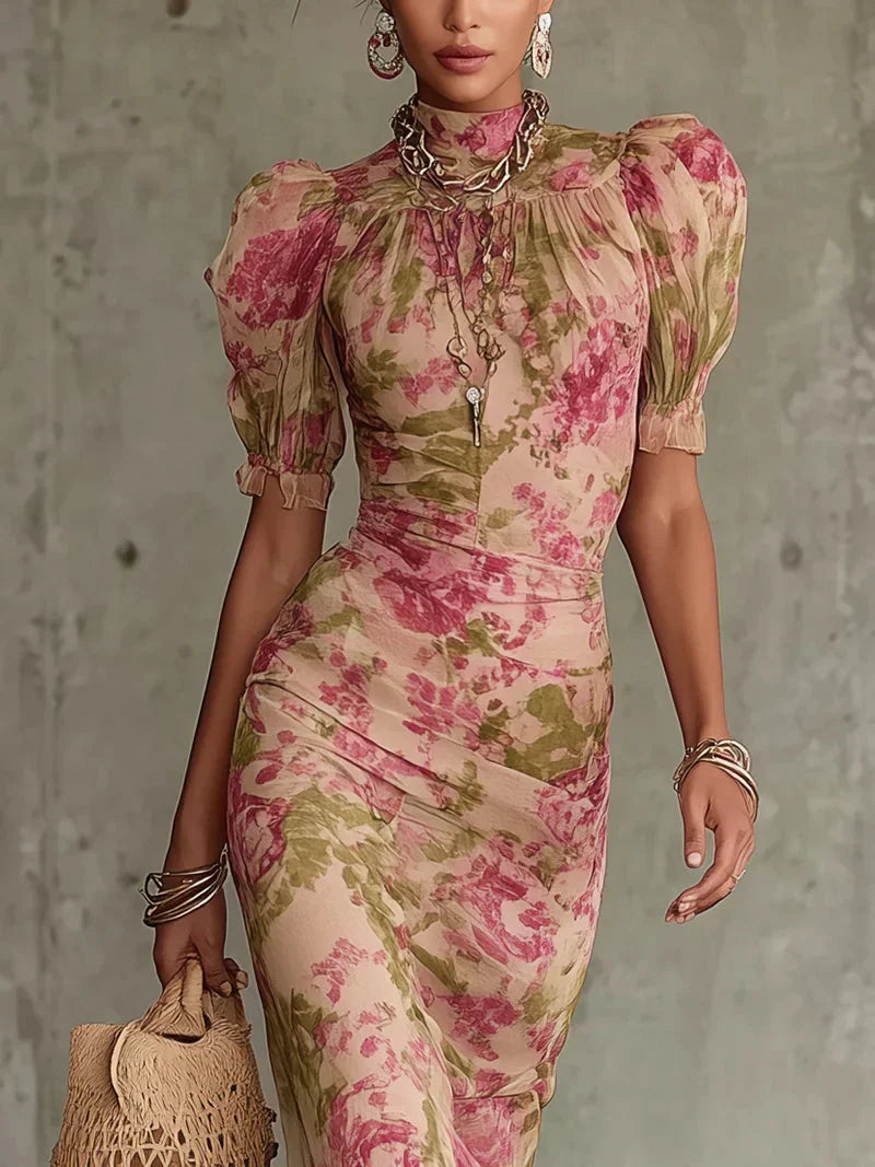 Detailed view of the high ruffled neckline and delicate puff sleeves on the floral maxi dress.