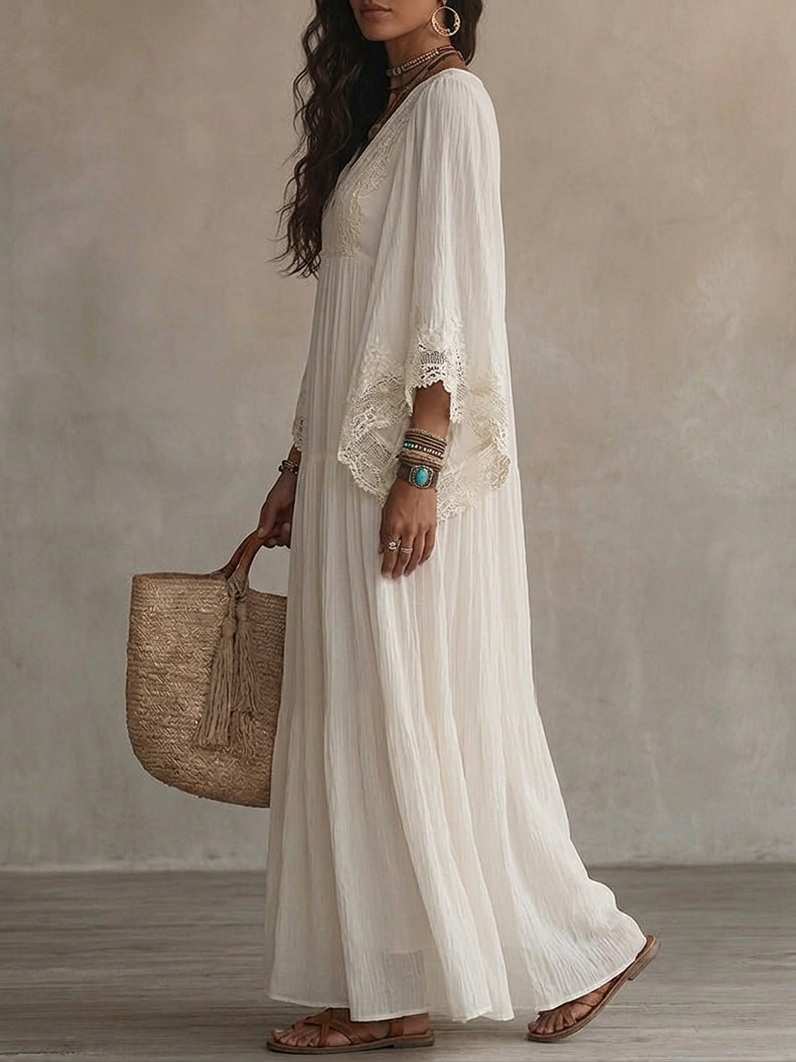 Model gracefully walking outdoors, highlighting the light and airy fall of the bohemian lace maxi dress.