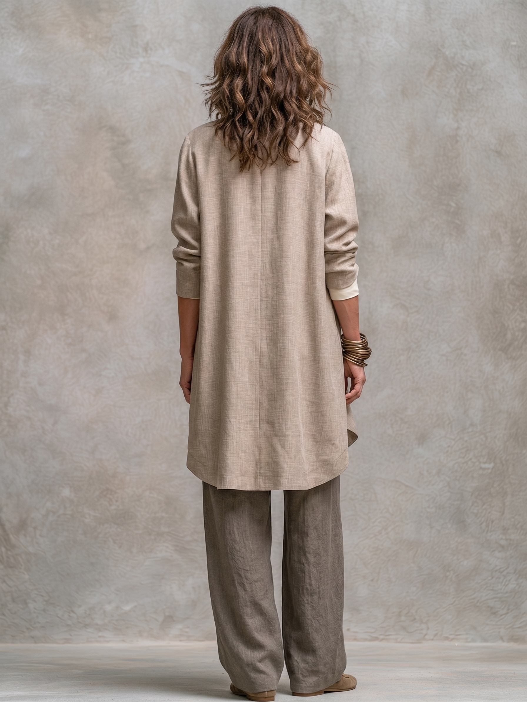 Model posing casually in the comfortable open-front jacket, demonstrating its ease of wear and modern appeal.