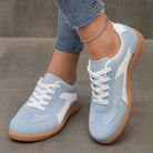 Close-up of the sky blue Adaline orthopaedic shoe, showing the breathable upper material and stitching details.