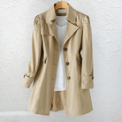 Back view of the Adeline elegant summer trench coat, revealing the smooth drape and classic design details.