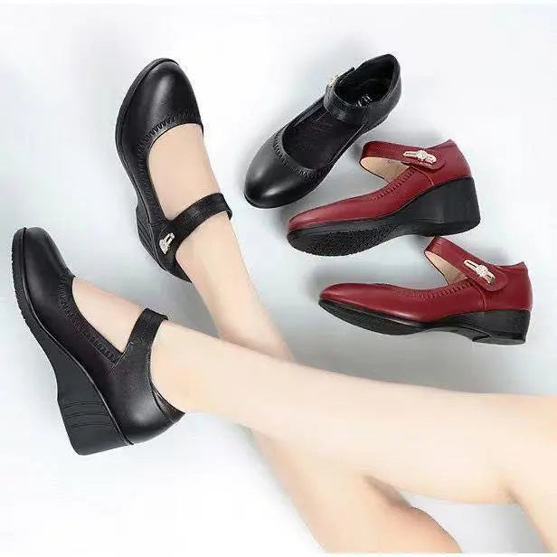 Back view of the black Alana mid-heel comfort shoes, highlighting the stable heel and overall elegant silhouette.