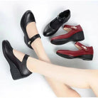 Back view of the black Alana mid-heel comfort shoes, highlighting the stable heel and overall elegant silhouette.