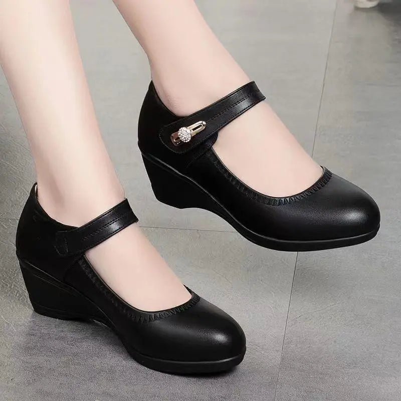 A woman wearing the Alana mid-heel comfort shoes in a professional setting, demonstrating their all-day wearability and style.