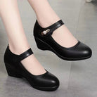 A woman wearing the Alana mid-heel comfort shoes in a professional setting, demonstrating their all-day wearability and style.