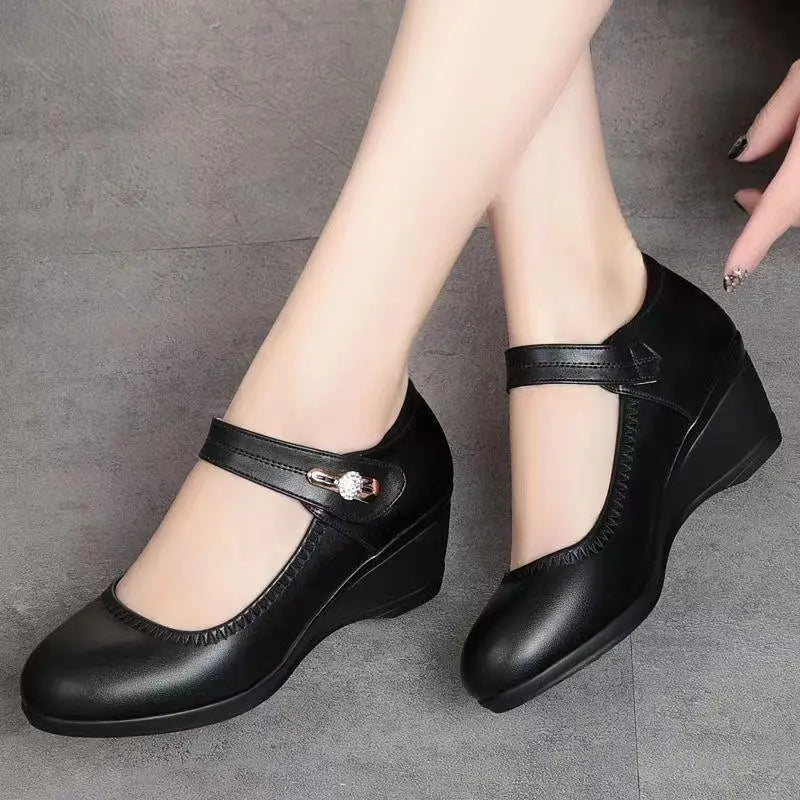 A pair of Alana mid-heel comfort shoes in beige, styled casually to show their versatility for various outfits.