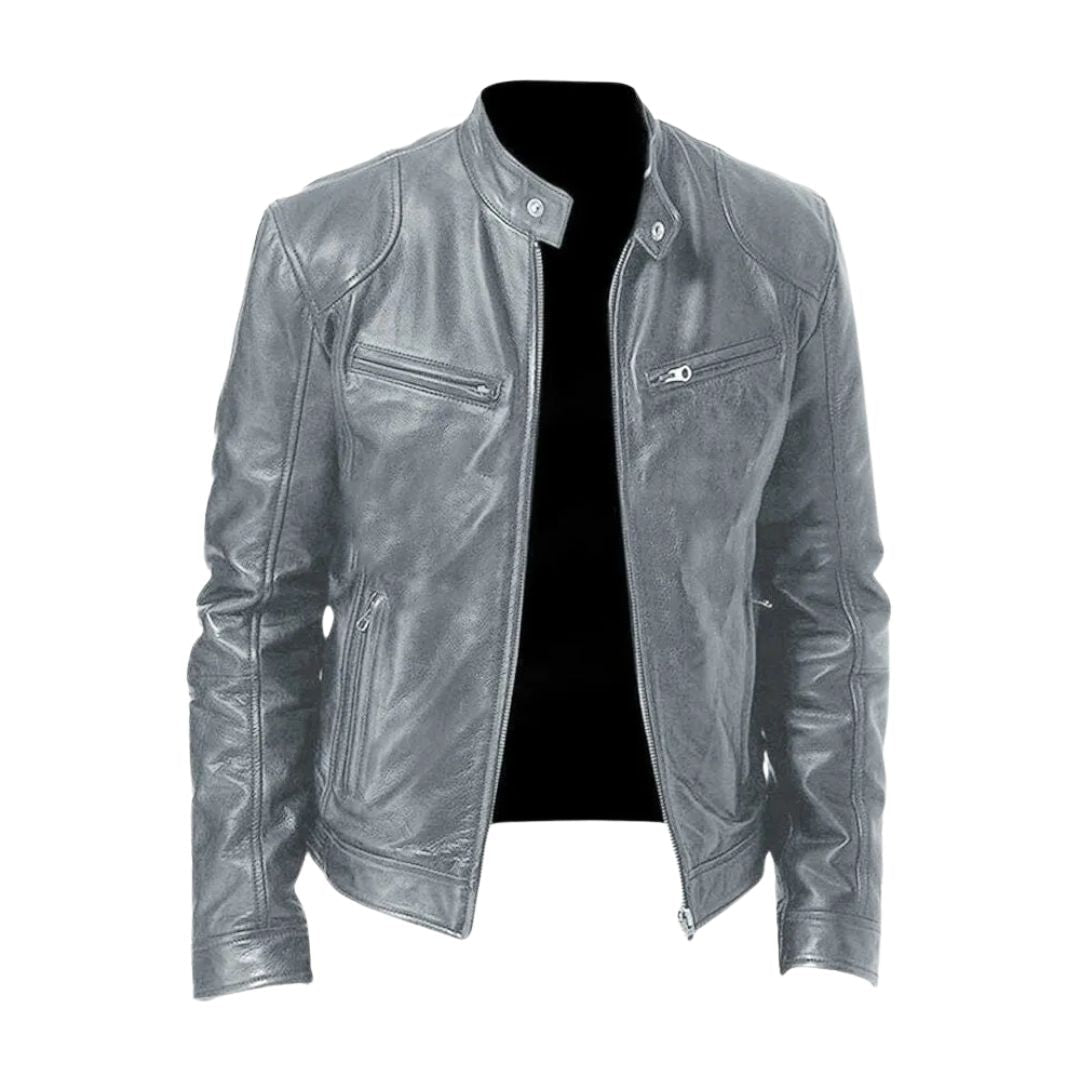 A model wearing the navy blue Alden leather jacket, captured in motion to show its comfortable fit.