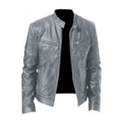 A model wearing the navy blue Alden leather jacket, captured in motion to show its comfortable fit.