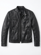 Close-up detail of the collar and zipper on a dark green Alden men's leather jacket, emphasizing craftsmanship.