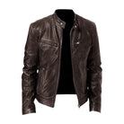 Texture shot of the khaki Alden leather jacket material, revealing the fine grain of the premium leather.
