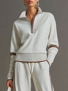 Overhead shot of the Anouk relaxed fit pants laid flat, highlighting the overall design and fabric consistency.