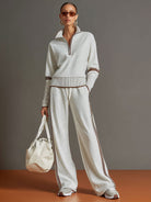 Back view of the Anouk relaxed fit pants on a woman, highlighting the smooth lines and flattering shape.