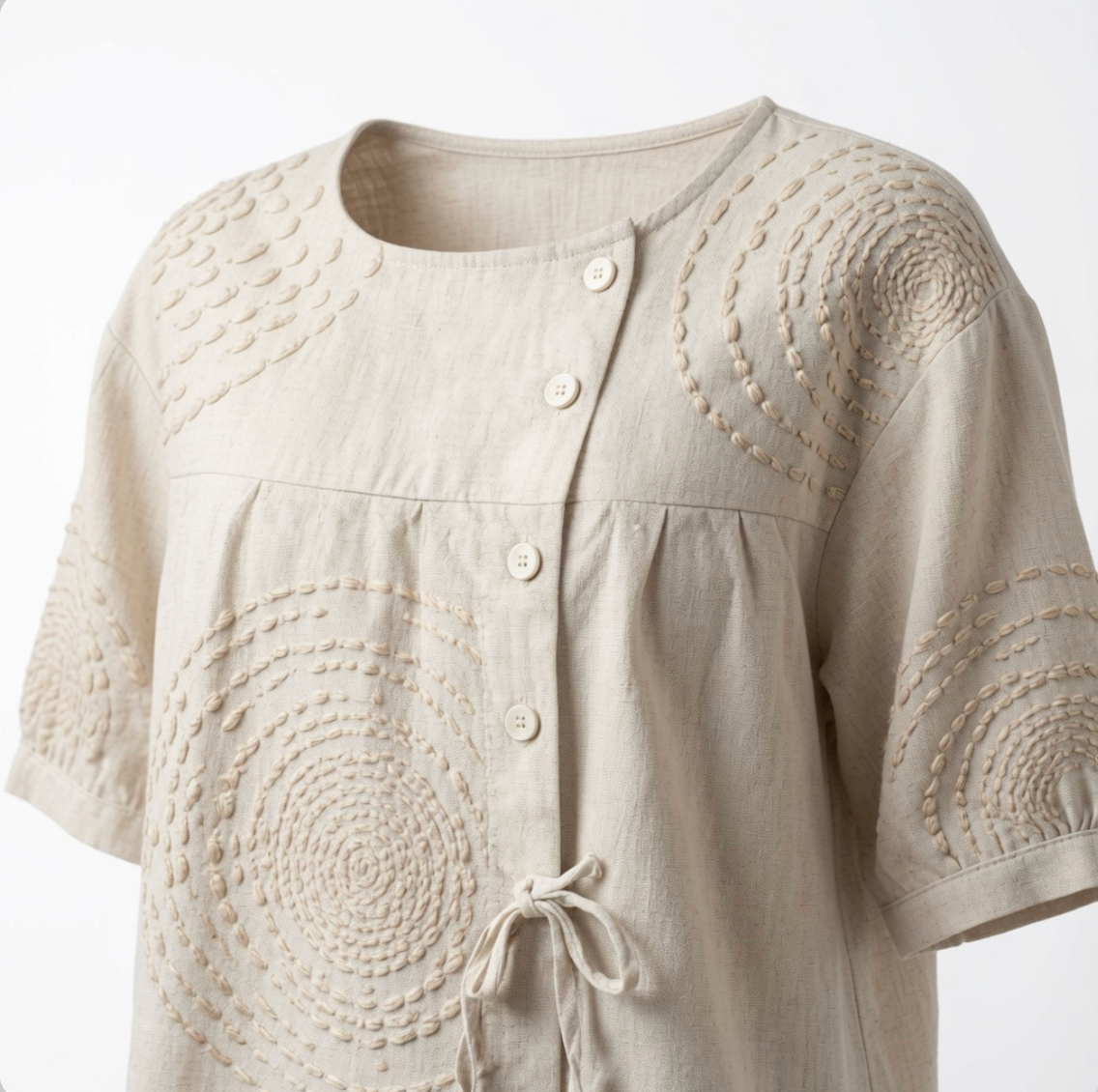 Side profile of the Seraphina casual top, illustrating the relaxed fit and the asymmetric button placket.