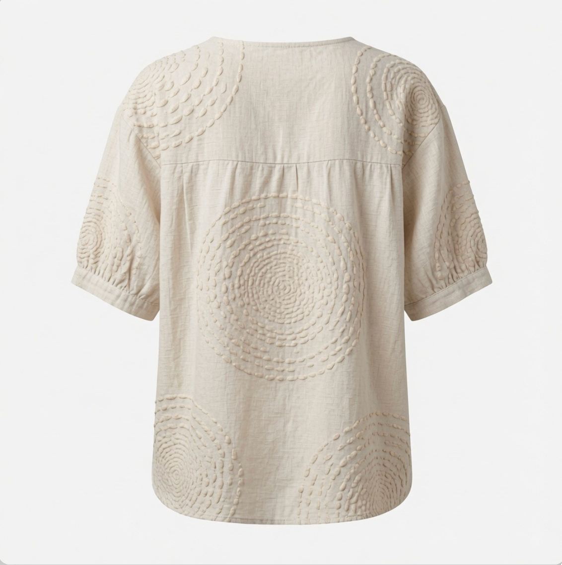 Back view of the Seraphina top, emphasizing the flowing silhouette and the quality of the fabric.
