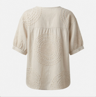 Back view of the Seraphina top, emphasizing the flowing silhouette and the quality of the fabric.