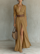 Lifestyle shot of the white Seraphina linen blend maxi dress styled with accessories for a daytime look.