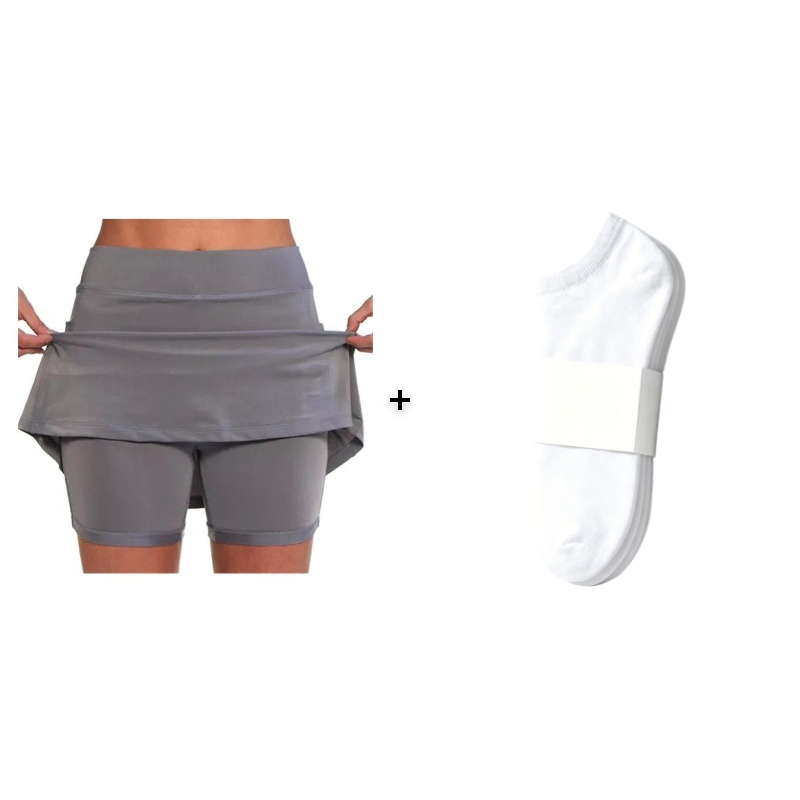 Close-up of the fabric's soft hand-feel on the purple skort, ensuring maximum comfort against the skin.
