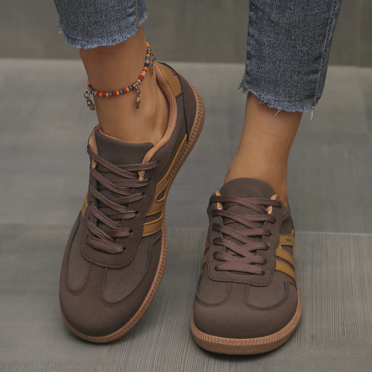 Detailed view of the leopard print Elara orthopaedic cushioned trainer, showing the unique pattern and sole design.