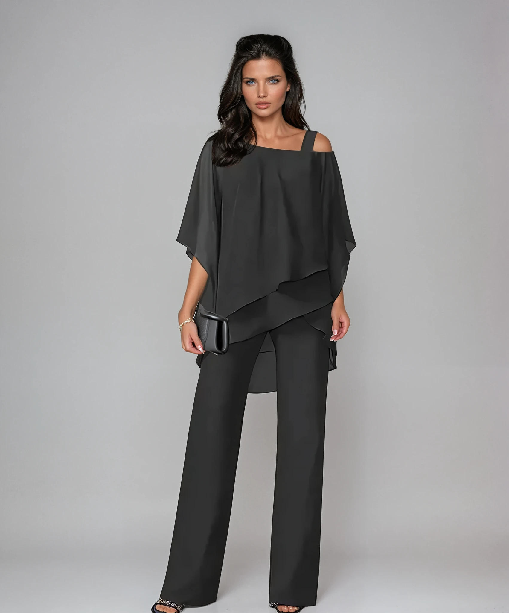 Detail shot of the breathable fabric texture and layered design of the two-piece set, worn by a model.