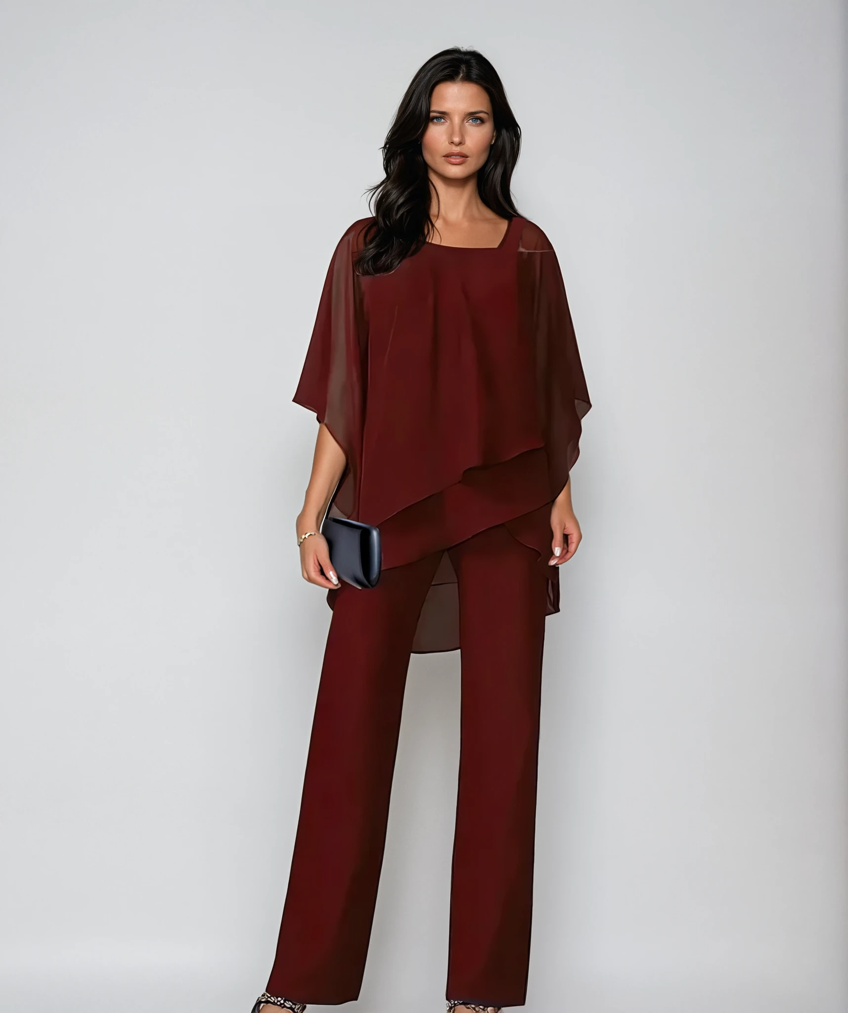 Lifestyle image of the two-piece layered set styled for an evening out, with accessories and soft lighting.