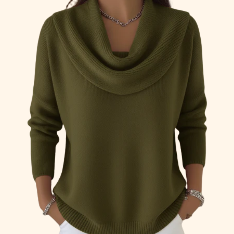 Model wearing Elina comfort fit pants in a vibrant green, styled casually with a white top.