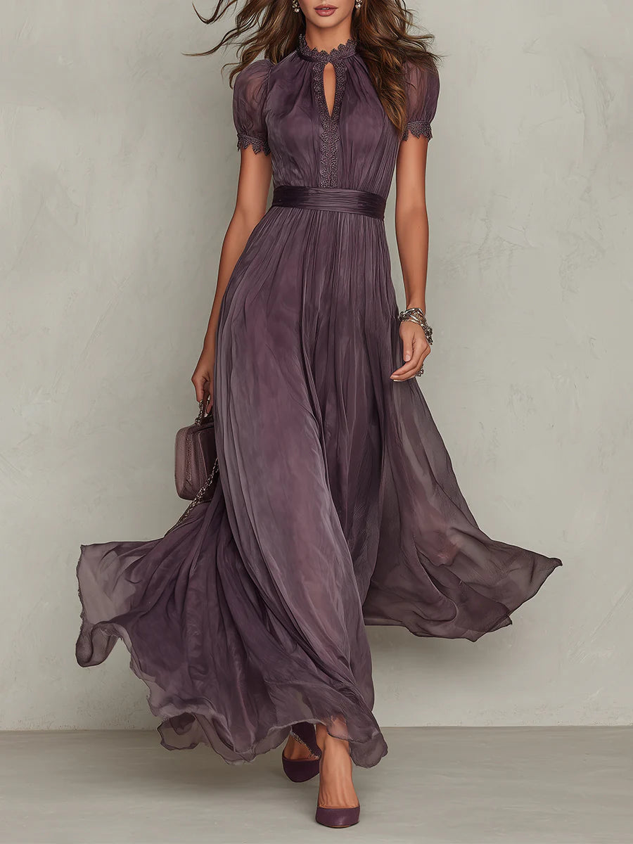 Front view of the Evadne purple chiffon lace maxi dress, showcasing the keyhole neckline and flowing skirt.