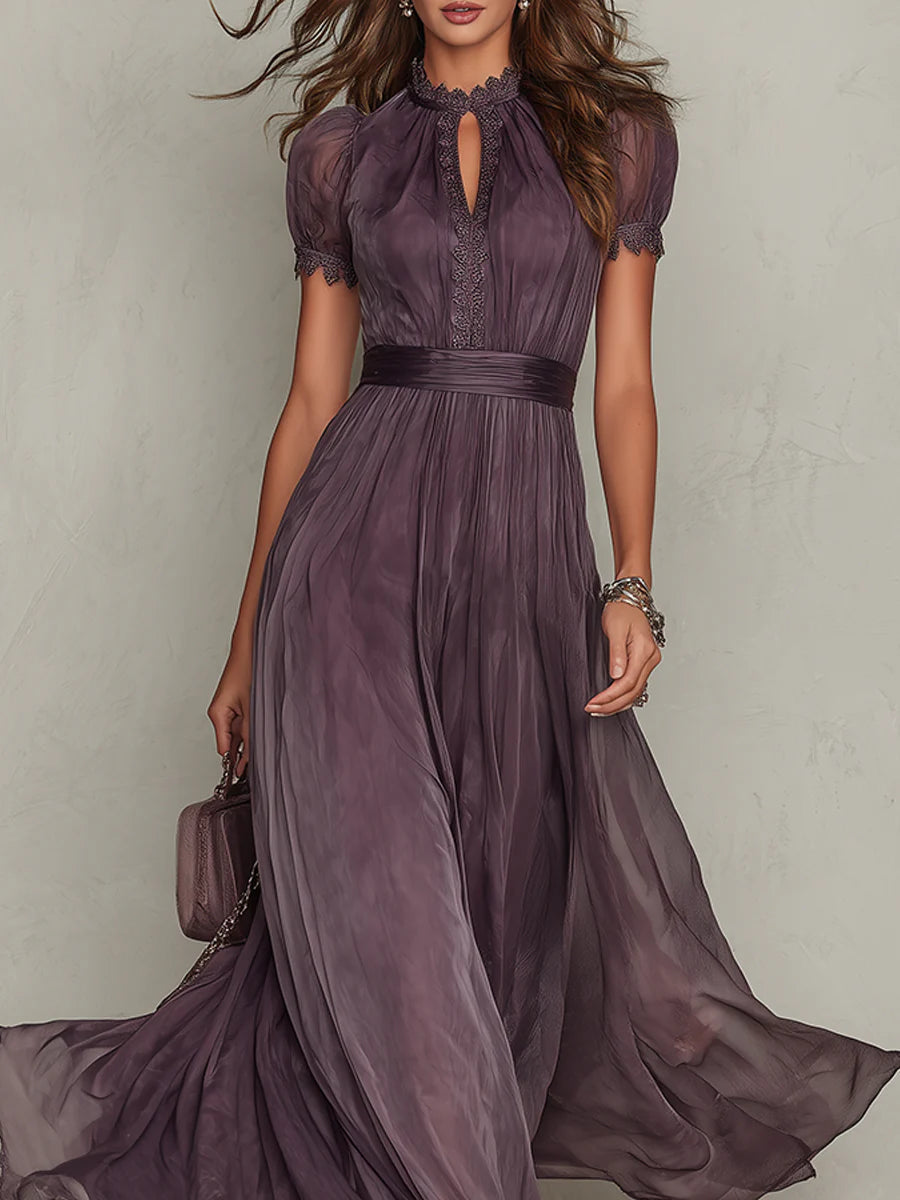 Back view of the purple chiffon lace maxi dress, showing the subtle closure and the luxurious flow of the fabric.