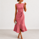 Full length shot of the draped midi dress in a rich sienna shade, perfect for a sophisticated evening occasion.