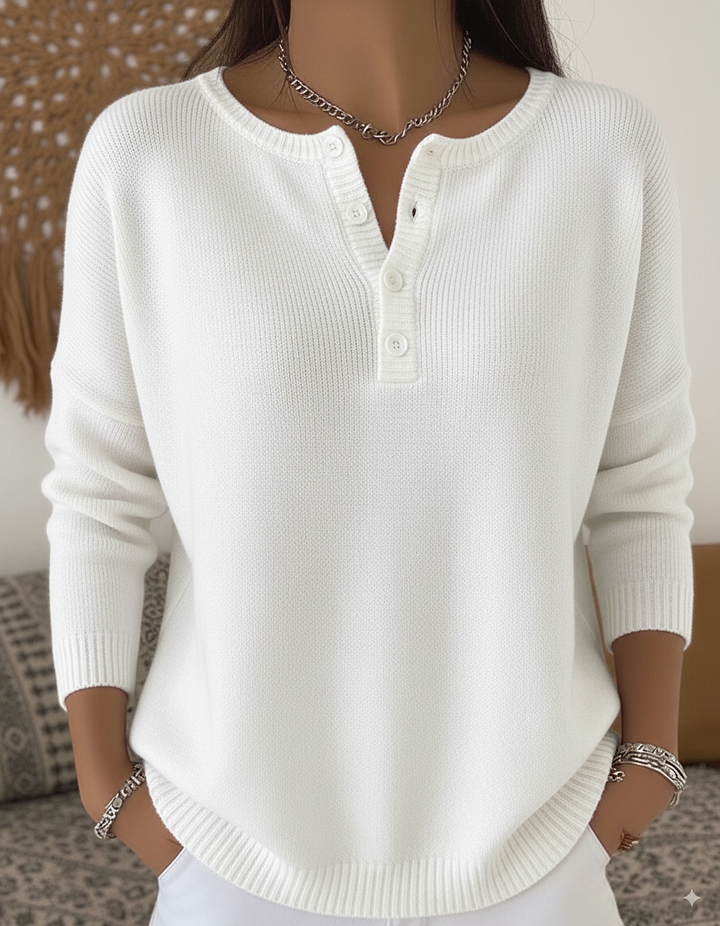 Close-up detail of the subtle buttons on the waistband of the comfortable button-up pants.