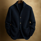 Detail shot of the wool blend fabric, illustrating the soft, tactile quality and tight knit of the stylish cardigan.