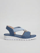 Artemis supportive cross-strap sandals in khaki, front view, showing the woven elastic cross straps and gold-tone ring.