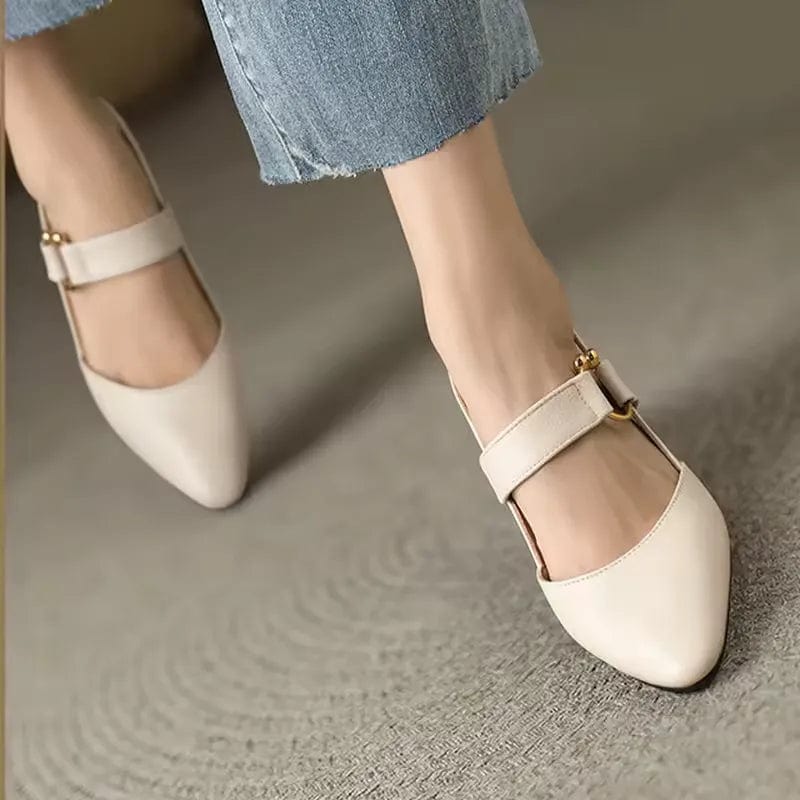 Interior view of a brown leather slingback heel, emphasizing the soft, cushioned footbed for comfort.