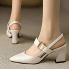 Collection display of black, brown, and beige leather slingback heels, showcasing color options.