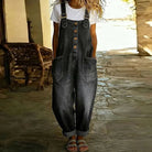 Back view of the black Hadley soft denim overalls, emphasizing the strap design and overall comfortable fit.