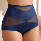 Close-up detail of the breathable mesh panels on pink high-waisted briefs for comfort.
