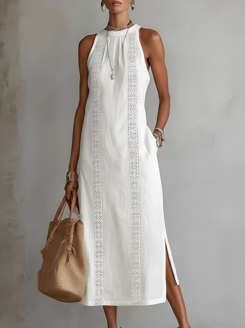 Full-length front view of the Eleni breathable midi dress in white, showcasing its loose fit and elegant Mao collar.