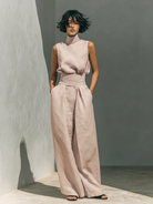 Stylish outfit featuring the wide-leg trousers paired with a complementary top for a cohesive and chic look.