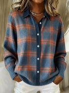 Front view of an Inez button-up cardigan in a vibrant orange shade, showcasing its relaxed drape.