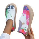 The flexible and cushioned sole of the Inez artistic slip-on shoes, emphasizing comfort features.