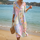 Front view of a woman wearing the Jolie soft floral midi dress, showcasing its flowing silhouette and comfortable fit.