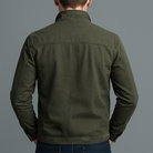 Close-up detail of the Lars rugged thermal jacket's collar and durable stitching, highlighting material texture.