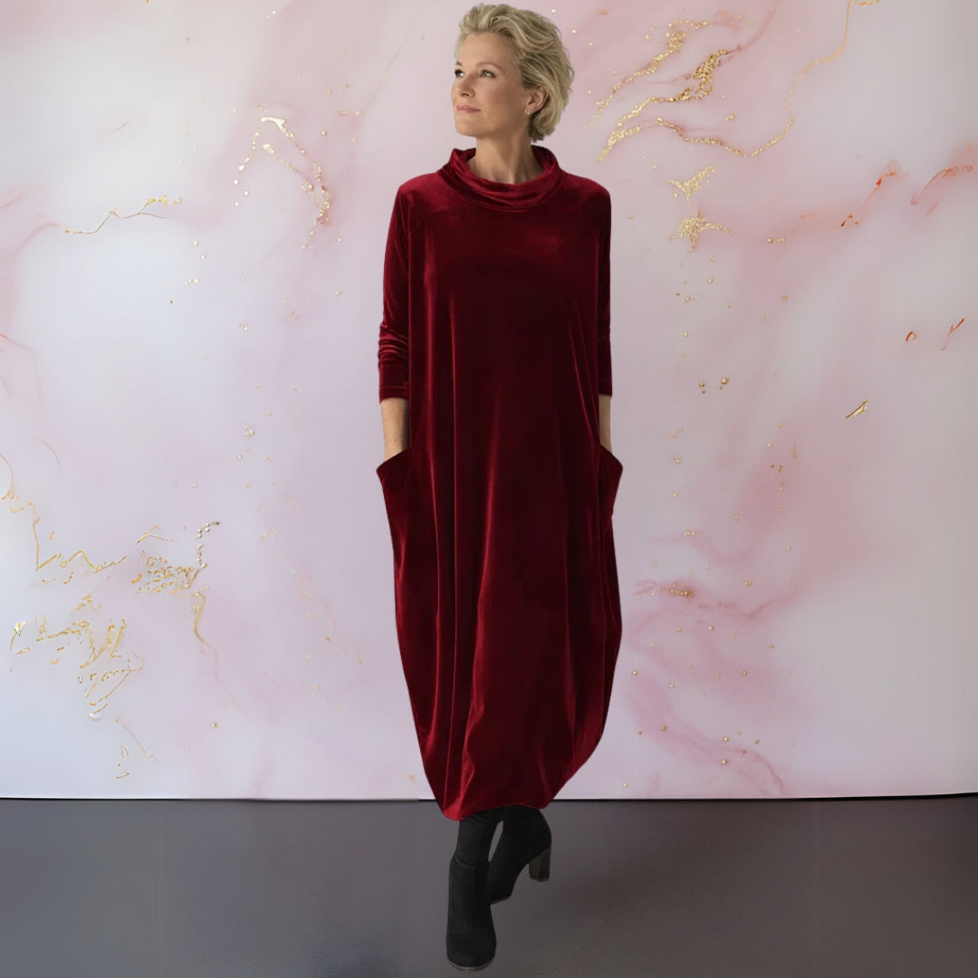 Close-up detail of the Leona velvet maxi dress's modern stand-up collar and luxurious fabric texture.