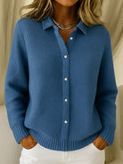Detail of the fine knit texture and button closure on the Lila cardigan.