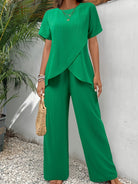 Close-up detail of the breathable fabric texture on the wide-leg pants, highlighting comfort.